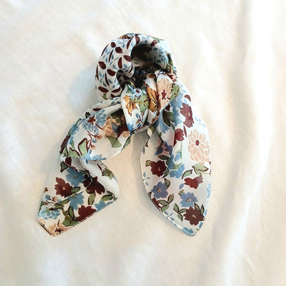 Floral patterned scarf on a light background