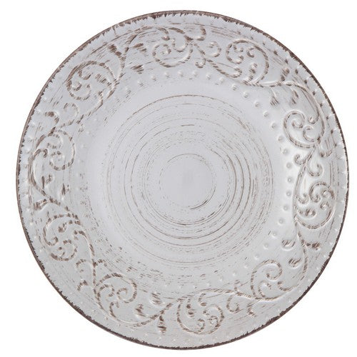 Decorative round plate with intricate patterns on a white background