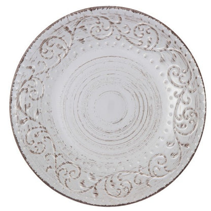 Decorative round plate with intricate patterns on a white background