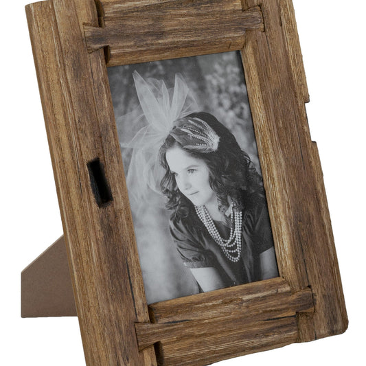 Wooden photo frame with a black and white photo of a woman inside