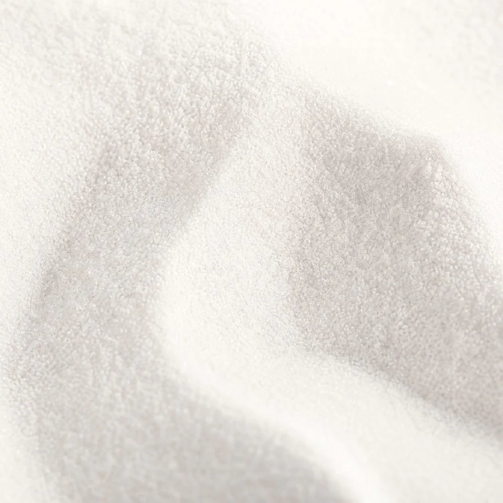 Close-up of white sand with a gradient effect
