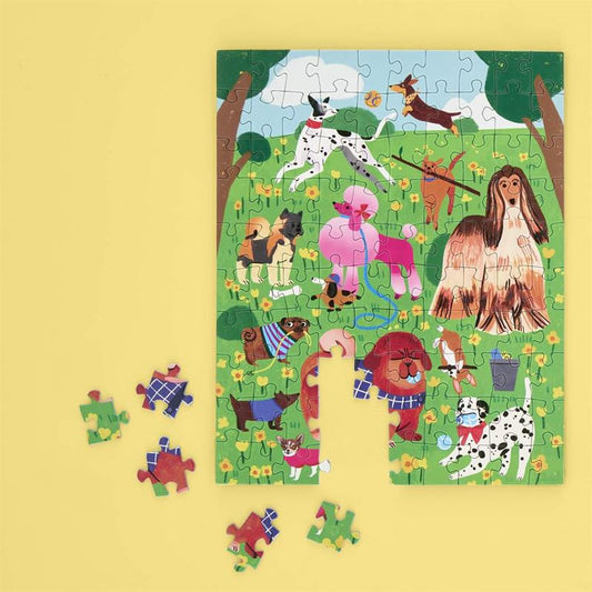 Children's puzzle with cartoon dogs on a yellow background